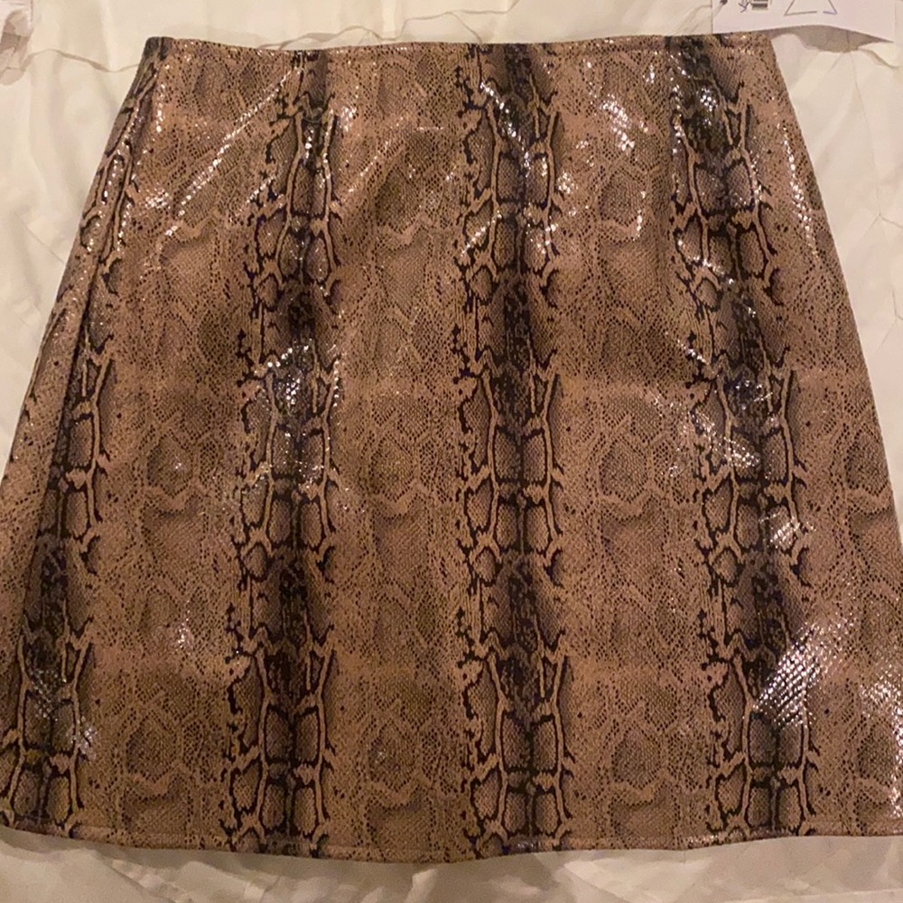 Sage, snake skin design with black and beige. Size XS